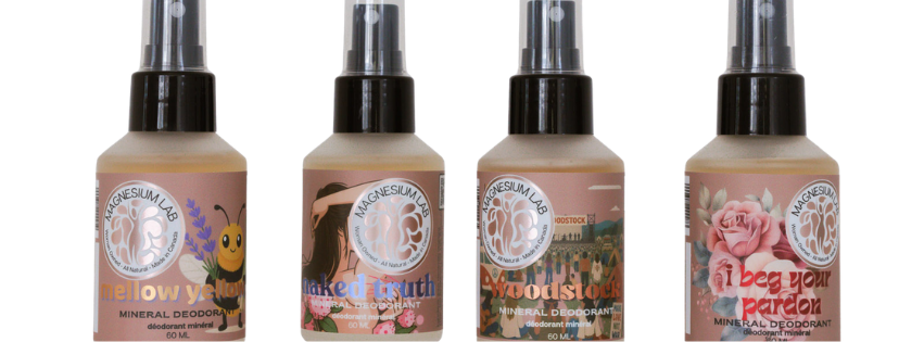 Image shows all 6 variants of magnesium deodorant spray layed out along a pink ribbon